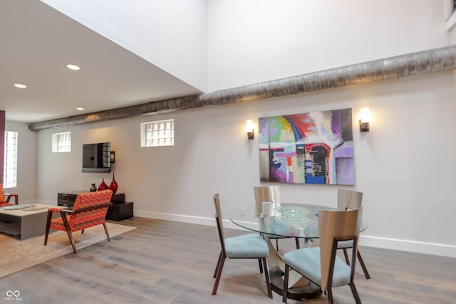 dining area featuring hardwood / wood-style floors