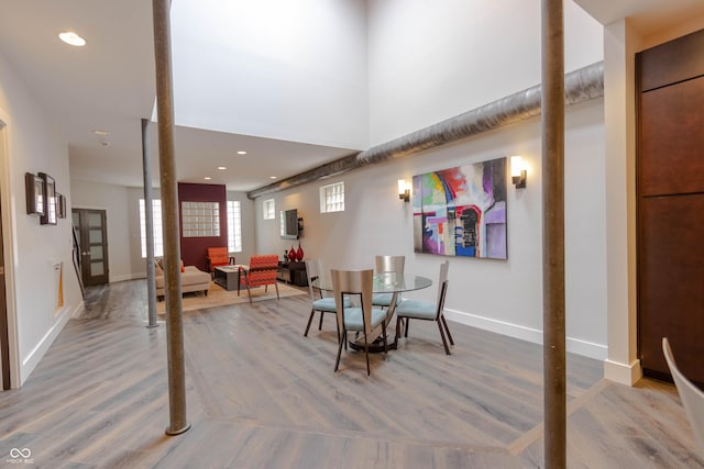 dining room featuring hardwood / wood-style flooring