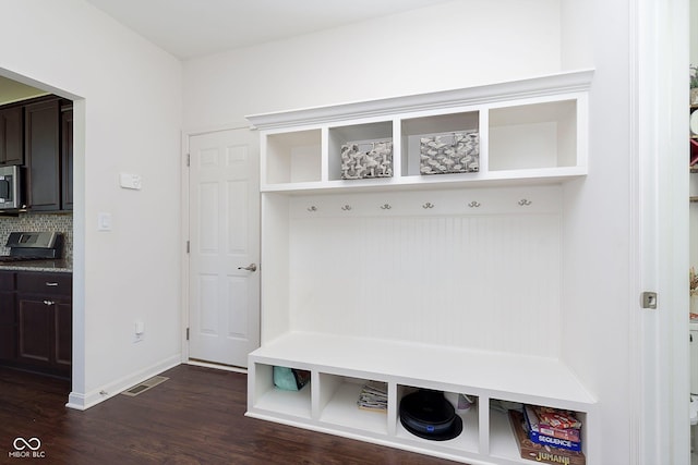 mudroom with dark wood-type flooring