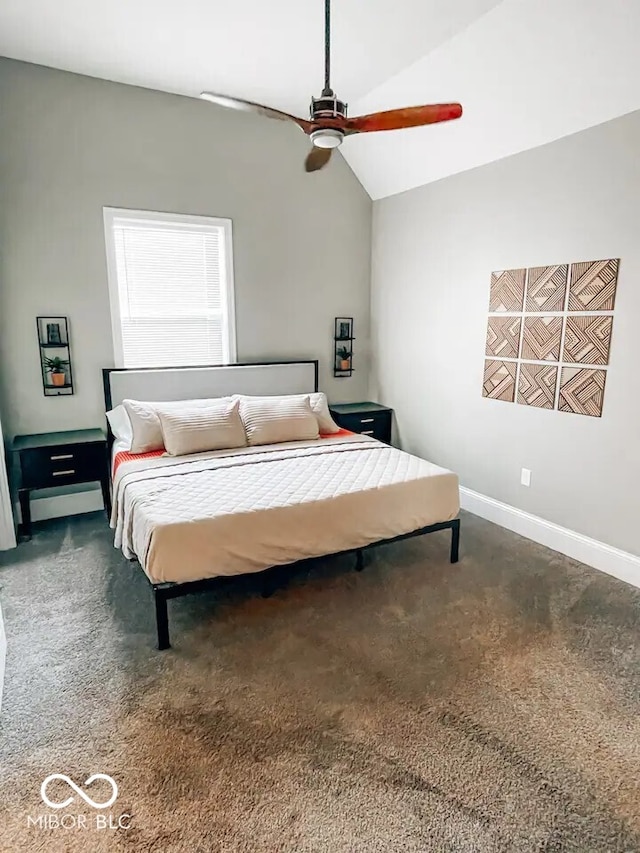 carpeted bedroom featuring vaulted ceiling and ceiling fan