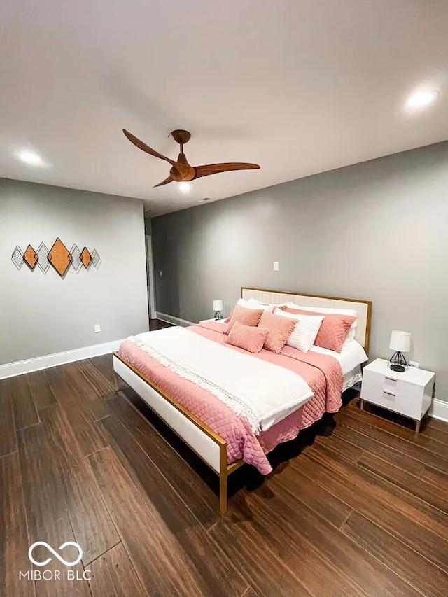 bedroom with ceiling fan and dark wood-type flooring