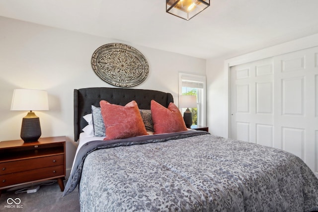 bedroom with carpet floors and a closet