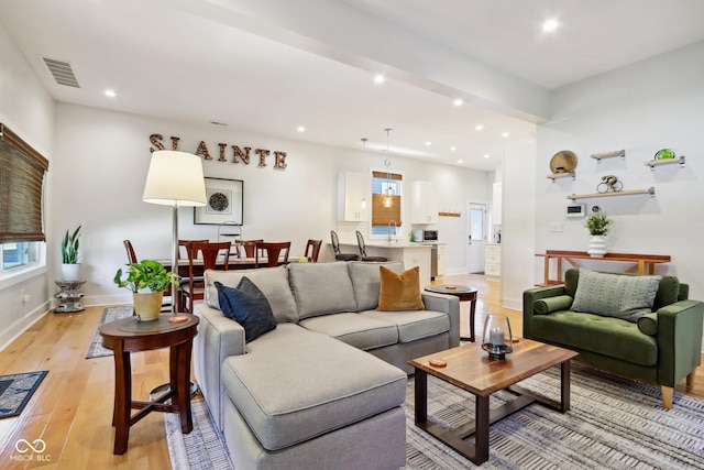 living room with light wood-type flooring