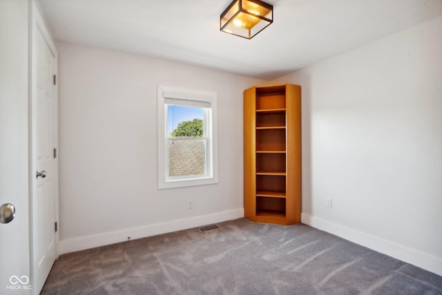 unfurnished bedroom featuring carpet floors