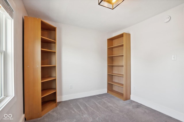 unfurnished bedroom with carpet