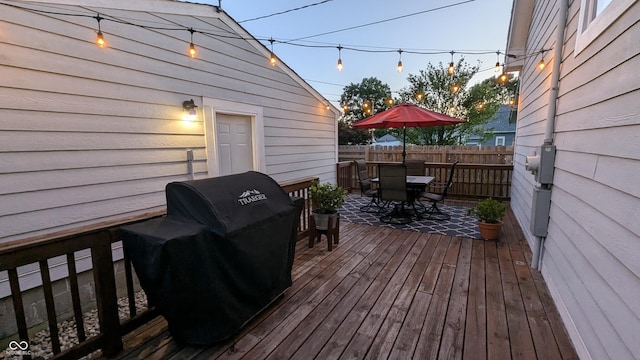 wooden deck with grilling area