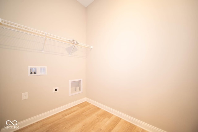 7936 Beaumont Green Pl, Indianapolis, IN 46250 - laundry area featuring light wood-style flooring, hookup for a washing machine, and electric dryer hookup