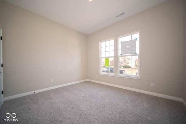 view of carpeted spare room