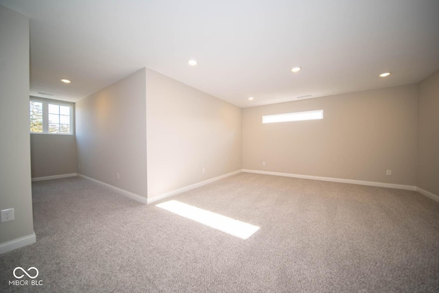 7936 Beaumont Green Pl, Indianapolis, IN 46250 - spare room featuring light colored carpet and recessed lighting
