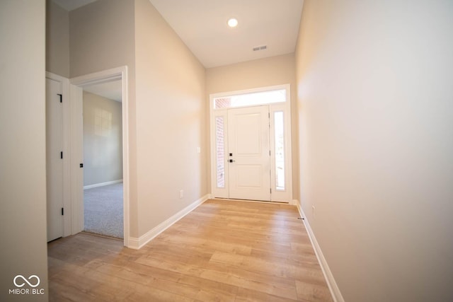 7936 Beaumont Green Pl, Indianapolis, IN 46250 - foyer with light wood-style flooring and recessed lighting