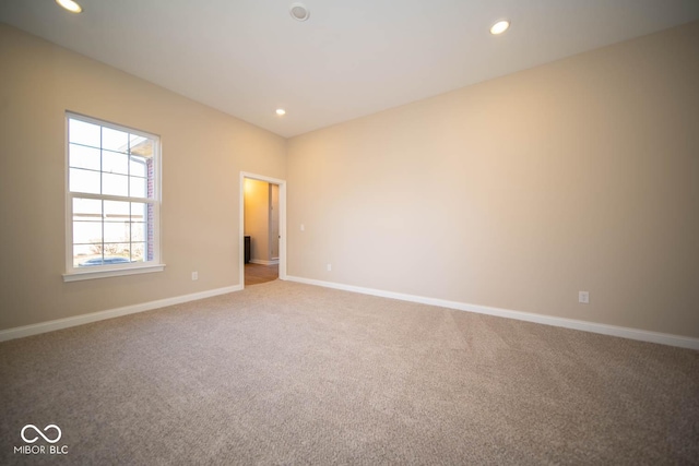 unfurnished room with carpet