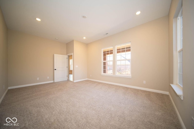 spare room with carpet flooring