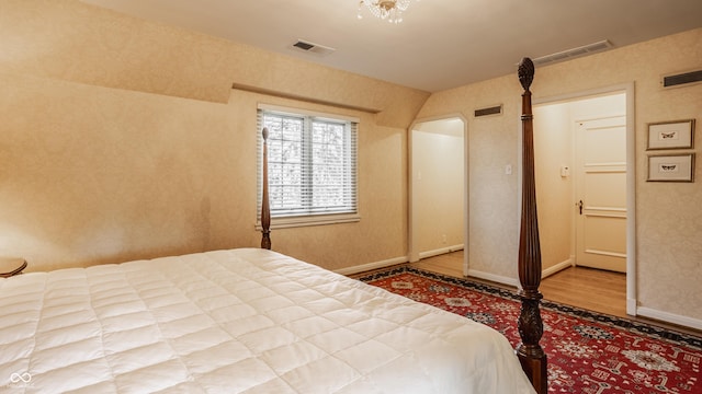 bedroom featuring hardwood / wood-style floors