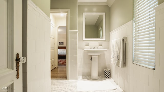 bathroom featuring tile walls and tile patterned flooring