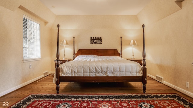 bedroom with wood-type flooring