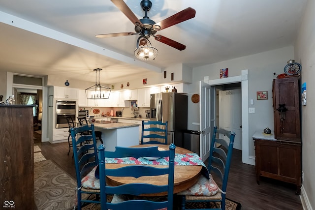 dining room featuring dark hardwood / wood-style flooring and ceiling fan