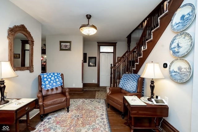 sitting room with hardwood / wood-style floors