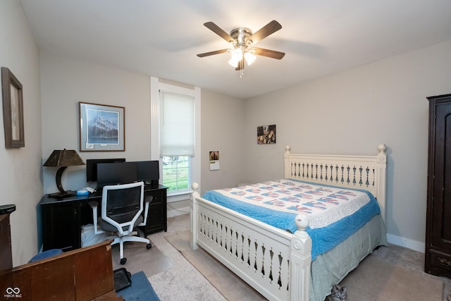 bedroom featuring light carpet and ceiling fan