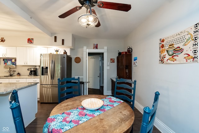 dining area with dark wood-type flooring