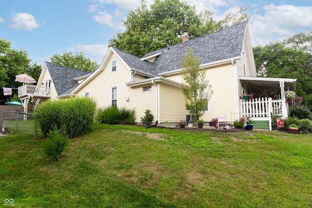 exterior space featuring a lawn