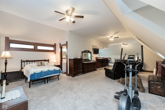 bedroom with ceiling fan, light colored carpet, and vaulted ceiling