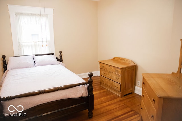 bedroom featuring dark hardwood / wood-style floors