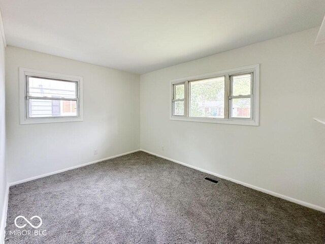 view of carpeted spare room