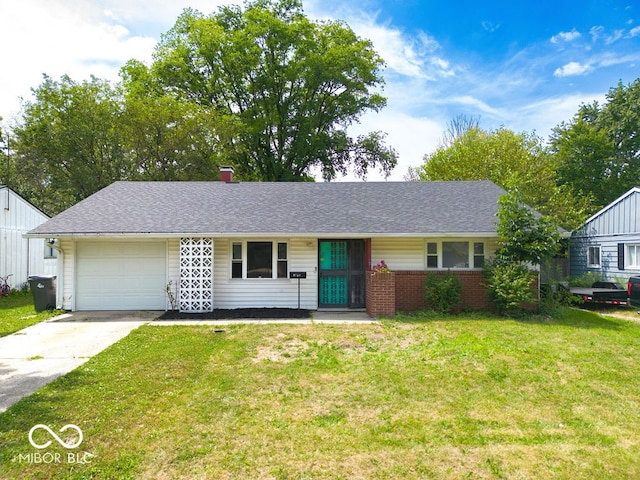 single story home with a front yard and a garage