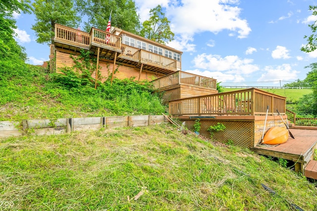 view of yard with a wooden deck