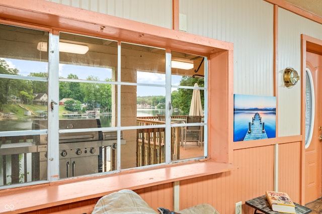 sunroom with a water view