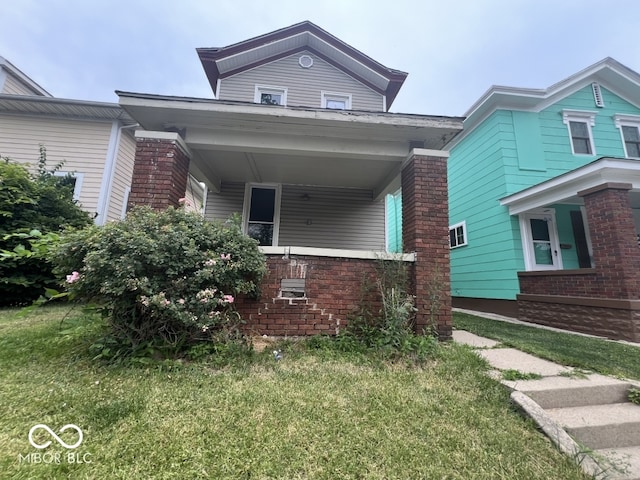 view of front of home with a front yard