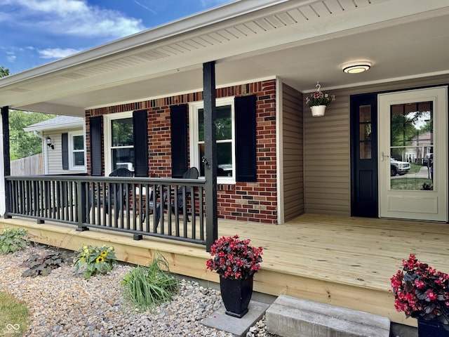 property entrance featuring covered porch