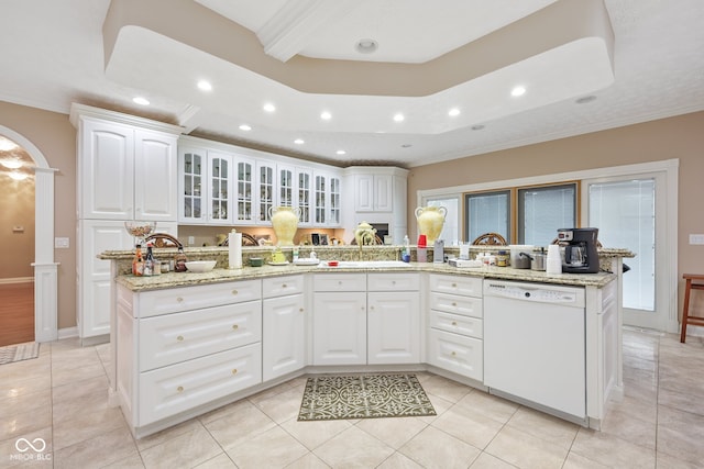 kitchen with white cabinetry, dishwasher, light tile patterned floors, and light stone countertops