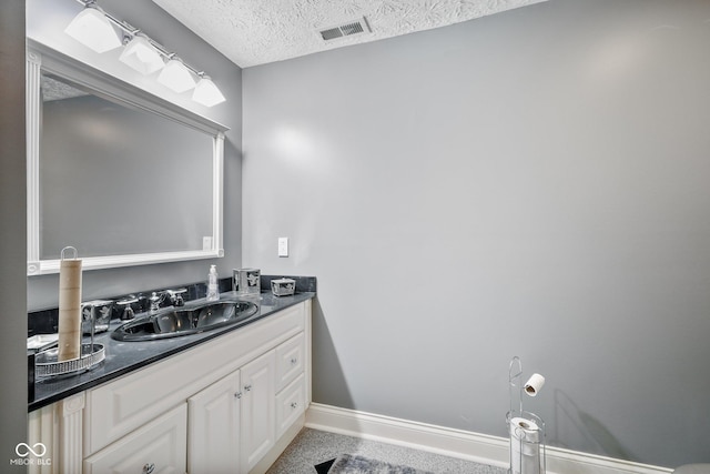 8292 S State Road 39th Rd S, Clayton, IN 46118 - bathroom with baseboards, a textured ceiling, and vanity