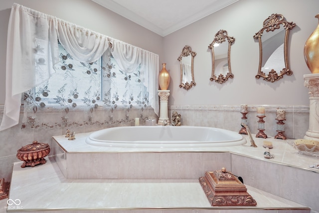 bathroom featuring tiled tub and crown molding