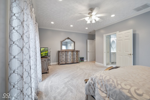 bedroom featuring ensuite bath, crown molding, a textured ceiling, carpet flooring, and ceiling fan