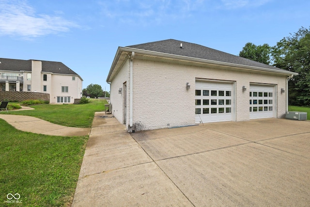 8292 S State Road 39th Rd S, Clayton, IN 46118 - view of side of property featuring driveway, a lawn, and brick siding