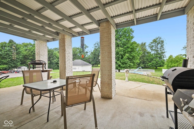 8292 S State Road 39th Rd S, Clayton, IN 46118 - view of patio with a pool, outdoor dining area, and view of scattered trees