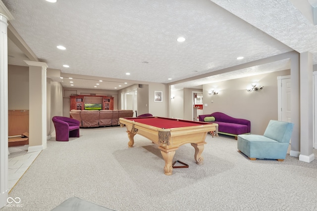 game room featuring carpet, billiards, and a textured ceiling