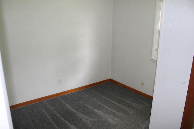 unfurnished room with carpet floors