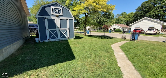 view of yard with a storage unit