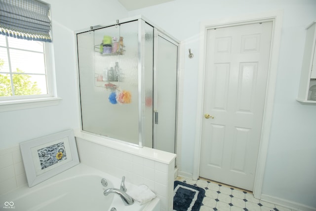 bathroom with independent shower and bath