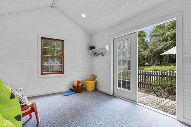 interior space with vaulted ceiling and a wealth of natural light