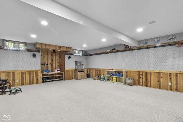 interior space with carpet floors and a workshop area