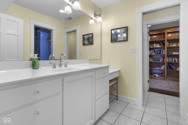 bathroom featuring vanity and tile patterned floors