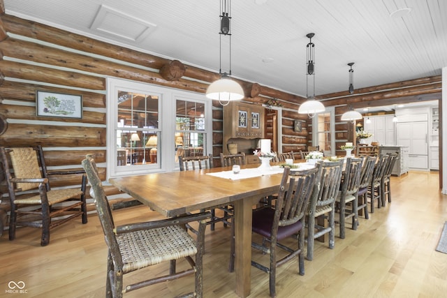 dining room with light wood-type flooring