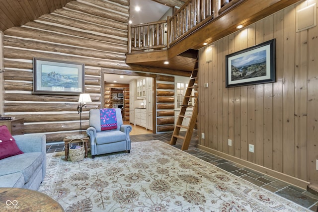 living room featuring high vaulted ceiling