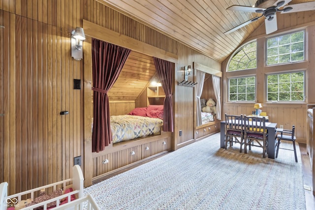 interior space with vaulted ceiling, wooden ceiling, and ceiling fan