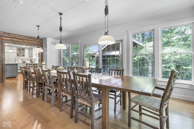 dining area with light hardwood / wood-style flooring