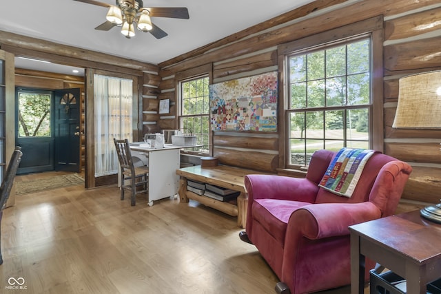 office space with ceiling fan and light hardwood / wood-style floors